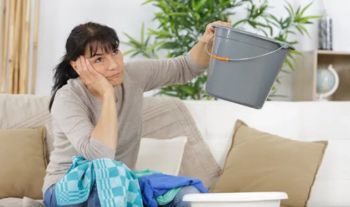 Why is it risky to ignore small, occasional drips after a storm