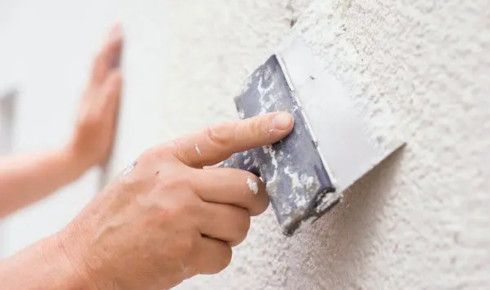 Why might tiny hairline cracks in walls still deserve a quick look now and then