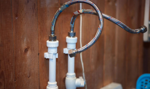 Why should flexible hoses under sinks be checked for bulges or cracks